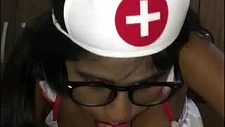 Young Latina nurse cares for patient in hospital room