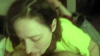 how's this redhead slave laying stomach-down deepthroating cock?