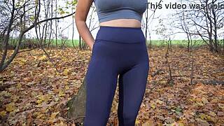 CHECK out this milf's FAT cameltoe bulging in yoga pants outdoors!