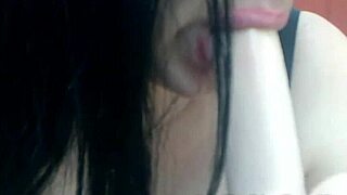 live cam girl deepthroats huge dildo during oral sex show