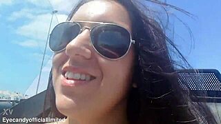 naughty brunette babe flashes her natural small tits and pussy from sports car top down outdoors