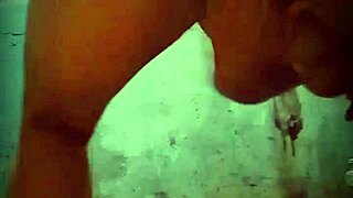 bbw with saggy tits gets naughty in the toilet stall