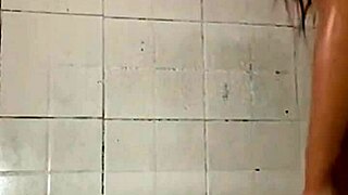 beautiful latina housewife flashes her natural tits and panties in bathroom then sends steamy video to shop owner