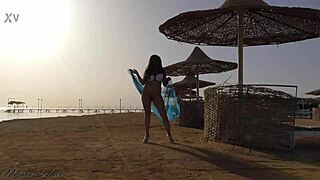 Wanna see me flash my bare pussy on crowded beach?