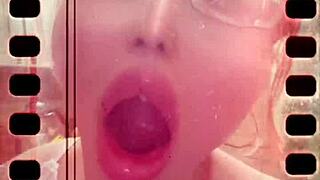 glasses-wearing beauty's endless yawns unleash a torrent of saliva and tongue play