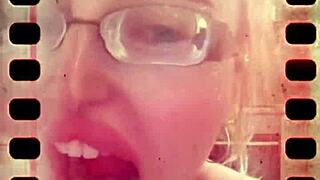 glasses-wearing beauty's endless yawns unleash a torrent of saliva and tongue play