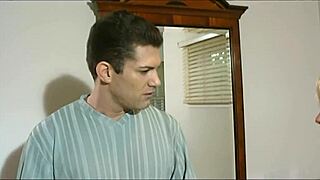 Hillary Scott bends over bed fingering shaved pussy in fishnets heels stockings