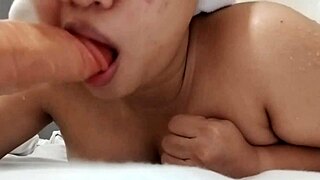 chubby filipina's big tits bounce in daring homemade dildo sucking dare