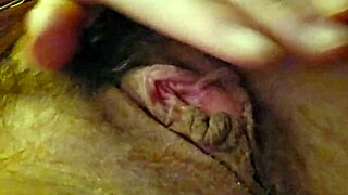 her clit buzzes wildly under vibrator as fingers tease deep