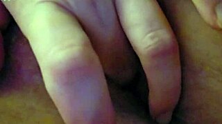 her clit buzzes wildly under vibrator as fingers tease deep
