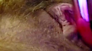 her clit buzzes wildly under vibrator as fingers tease deep
