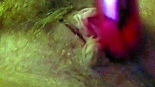 her clit buzzes wildly under vibrator as fingers tease deep