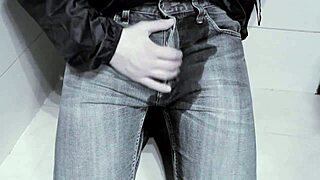 Amateur Homemade Jeans Peeing Closeup in Public Toilet Stall