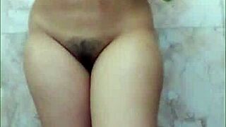 Chubby Indian beauty fingers herself in bathroom with dirty Hindi sex talk and big natural tits