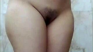 Chubby Indian beauty fingers herself in bathroom with dirty Hindi sex talk and big natural tits