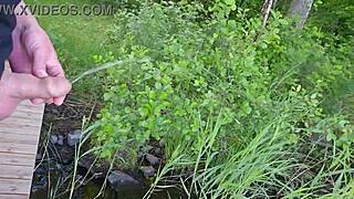 milf grips old man's small cock while he pees in garden wetting her fingers compilation