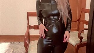 Goddess singer in latex catsuit dominates with feet, glasses, and financial control