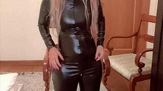 Goddess singer in latex catsuit dominates with feet, glasses, and financial control