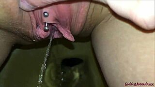 she spreads her wet pussy for his hungry tongue in the bathroom