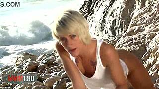 hey, watch nicky wayne strip her petite body naked on the beach