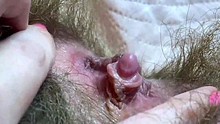 Her huge clitoris throbs under fingers to wild orgasm close-up