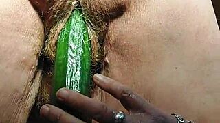 granny slut fucks hairy pussy deep with thick cucumber