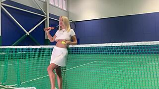 blonde gymnast stretches nude on tennis court teasing uniform
