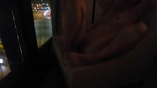 what if she fingers her clit close-up by the hotel window in public?