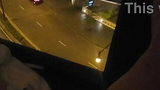 what if she fingers her clit close-up by the hotel window in public?