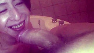 asian mature lady gets showered bathed sucked off then bed fucked hard with creampie finish