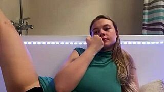 sexy student sneaks to bathroom fingering her big natural tits till orgasm hits hard