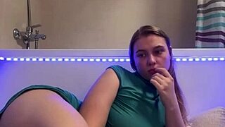 sexy student sneaks to bathroom fingering her big natural tits till orgasm hits hard