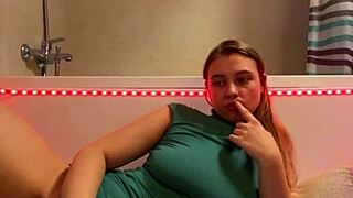 sexy student sneaks to bathroom fingering her big natural tits till orgasm hits hard