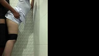 Naughty Thai nurse sneaks patient friend into hospital bathroom for rough quickie ending in mouth cumshot