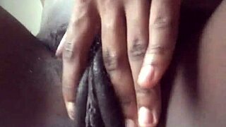 Hot ebony spreads wide hairy beaver pussy!