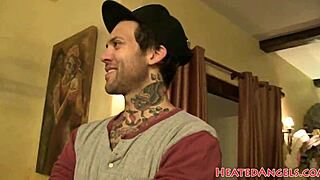 petite goth babe poses with piercings and tattoos