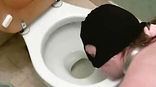 My slave whore gets humiliated in the filthy pissoir