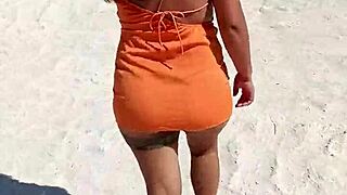 papi check out this puta mexicana flashing her tanga and tetas on public beach