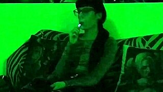 beth kinky goth teen mistress smokes seductively in green hd glow