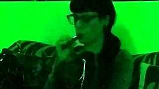 beth kinky goth teen mistress smokes seductively in green hd glow