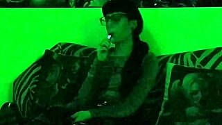 beth kinky goth teen mistress smokes seductively in green hd glow