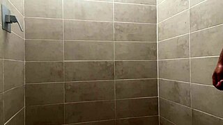 Hot Latino guy strokes his huge cock in shower moaning to orgasm