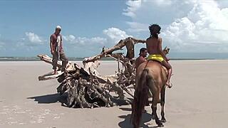 beach threesome stretches black mom's shaved pussy