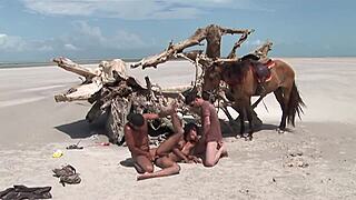 beach threesome stretches black mom's shaved pussy