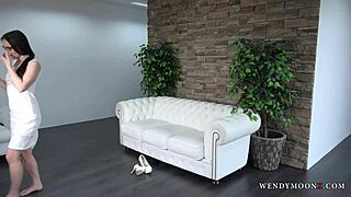 wendy moon strips naked posing seductively in heels on sofa for photoshoot