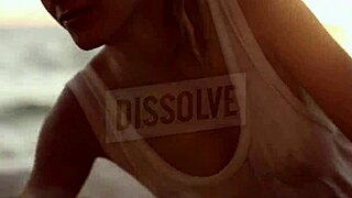 russian blonde in wet see-through bra on salty beach