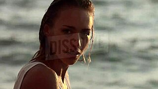 russian blonde in wet see-through bra on salty beach