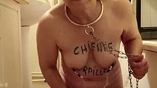 FRENCH HOUSEWIFE SLAVE SPANKS HER TITS SOLO PISSES IN BONDAGE HUMILIATION