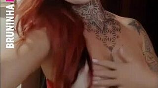 you won't believe this sexy tattooed redhead's big clit under her no-panty dress?