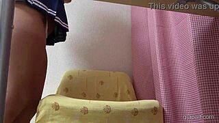 TANNED JAPANESE GIRL WEDGIE PULLS MICRO THONG UPSKIRT CHAIR CAMELTOE BOOBS!